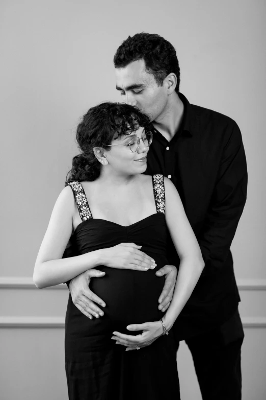 black and white po of a pregnant couple