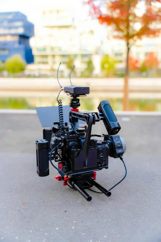 the camera is positioned on a dolly with a laptop