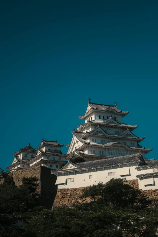 the tower of a temple on the top of the hill