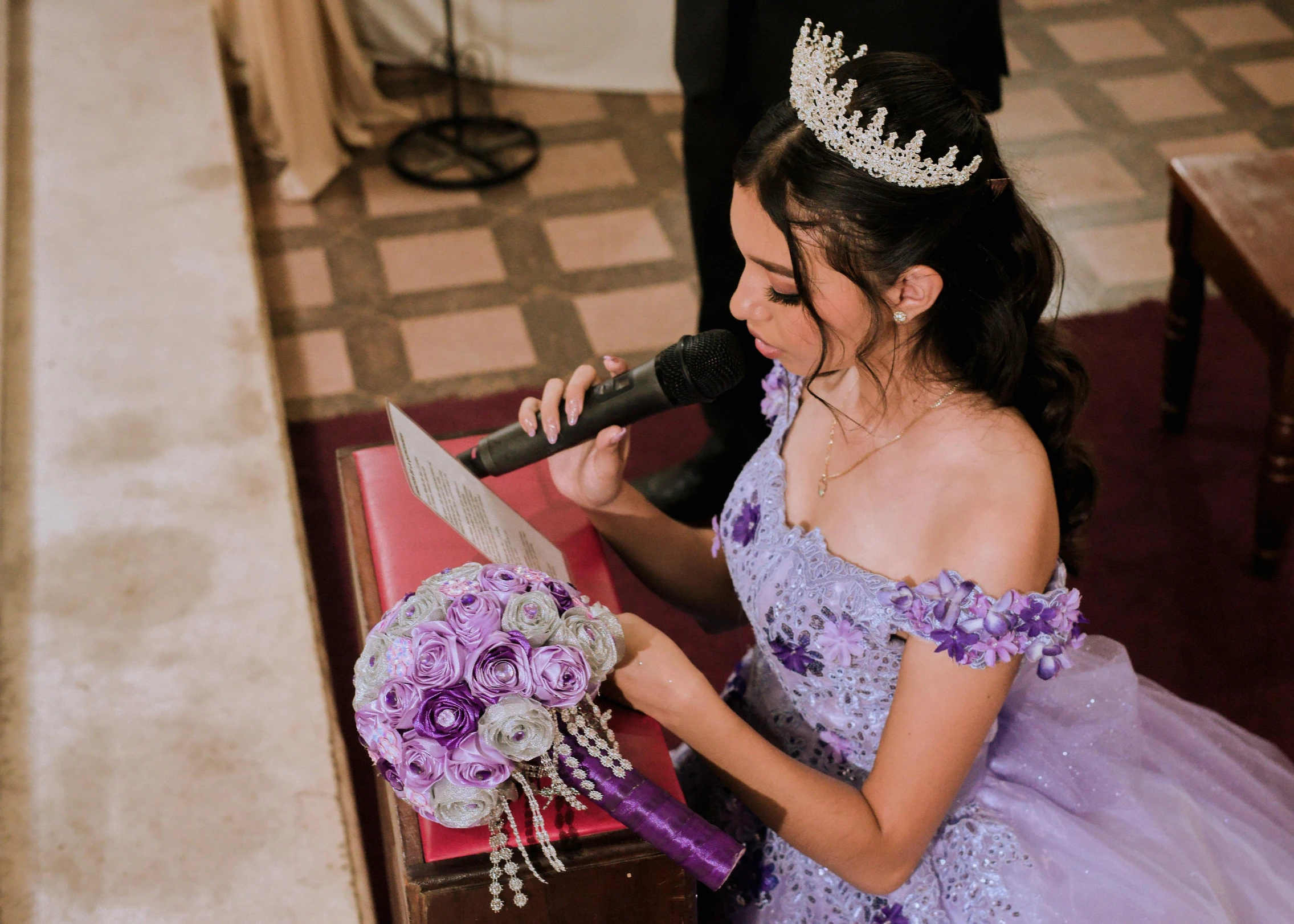 the girl dressed up as the princess has a sword in her hand