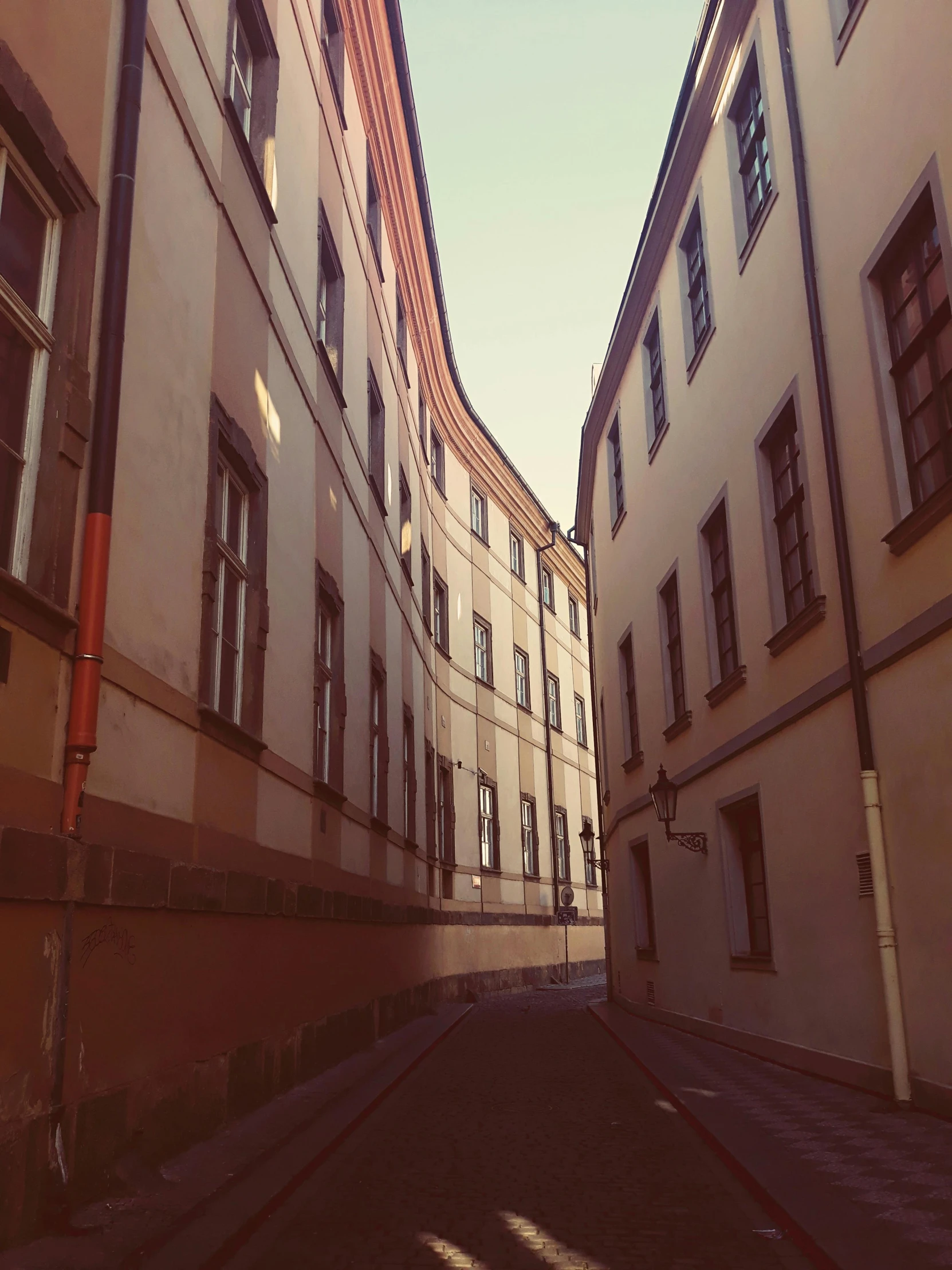 an alley way in a european city