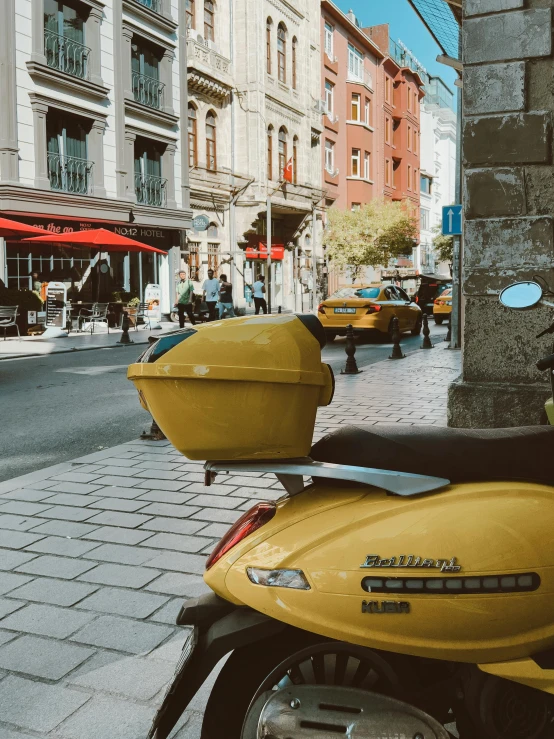 motorcycles are parked in the city side by side