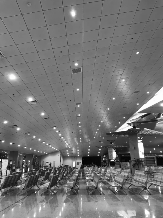 a black and white po of an airport waiting area