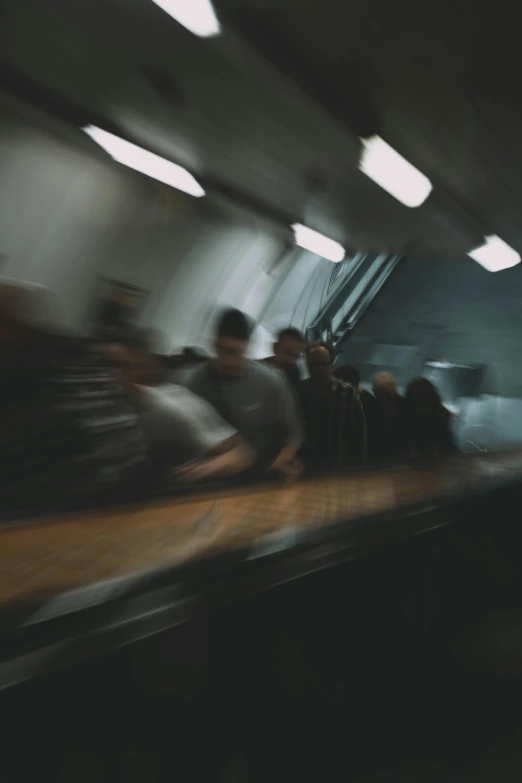 people that are walking in a large tunnel