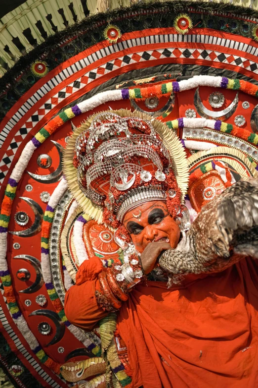 a woman with an elaborate decorated face and nose