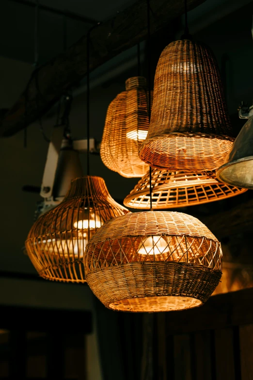 hanging lights made from rattan and metal rods