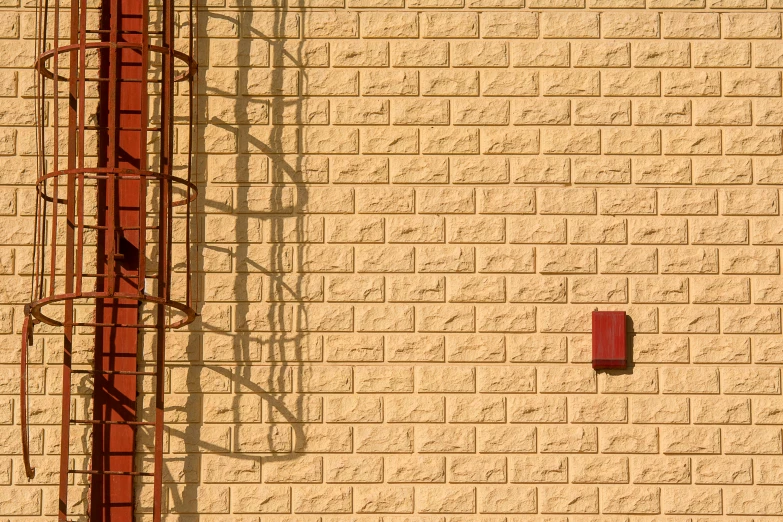 a fire hydrant on the corner of a building