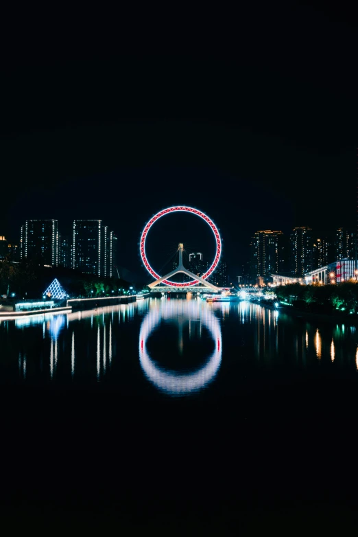 a city skyline at night with light painted on it