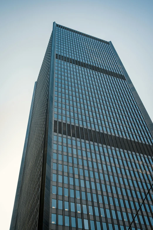 an upward view of the outside of a large building