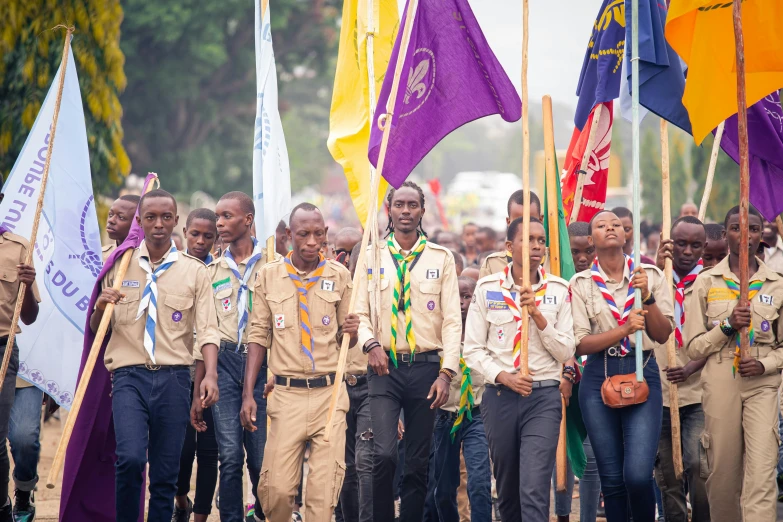 a group of people with medals walking in a row