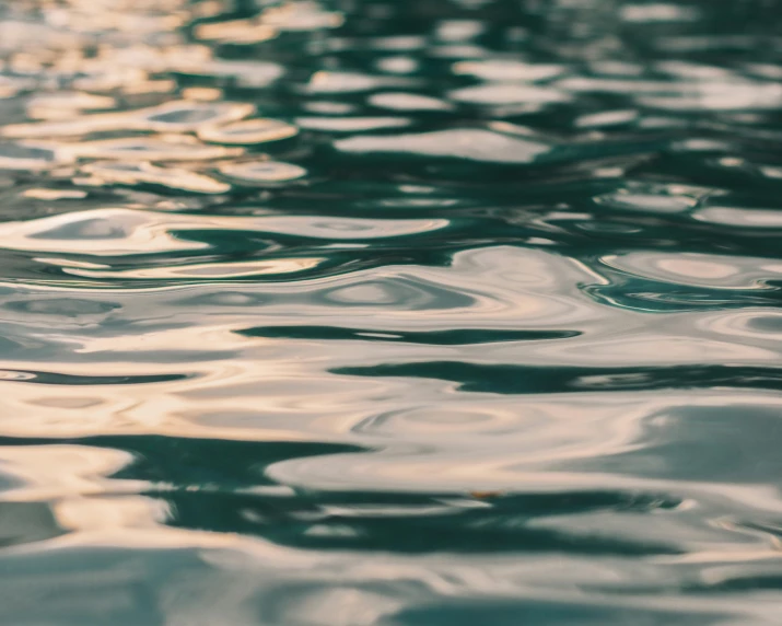 a view from the water with abstract waves