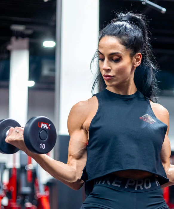 a female bodybuyer performing an exercise