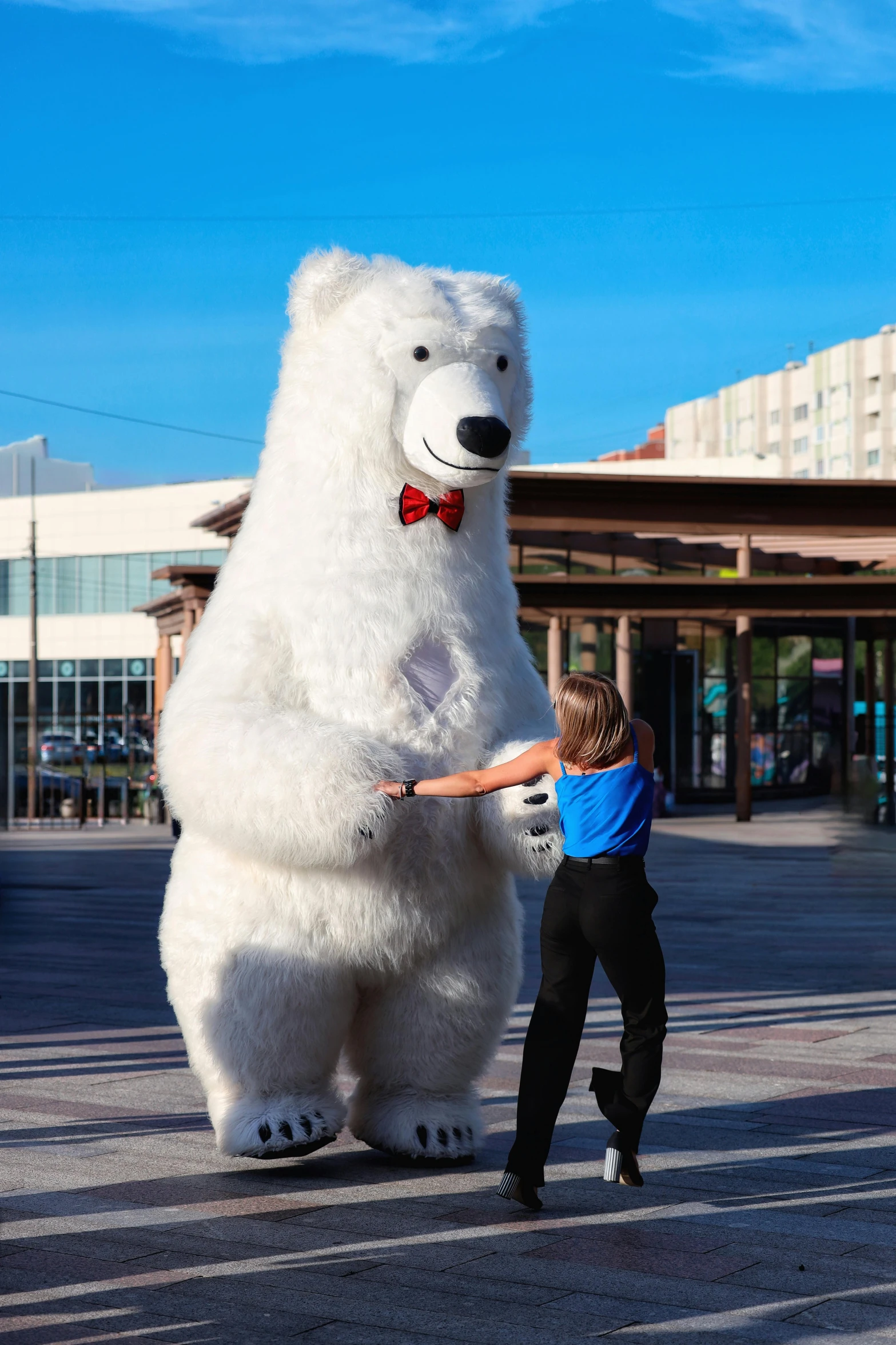 there is a person in a giant white bear costume