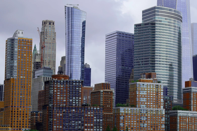 a view of some very tall buildings in the city