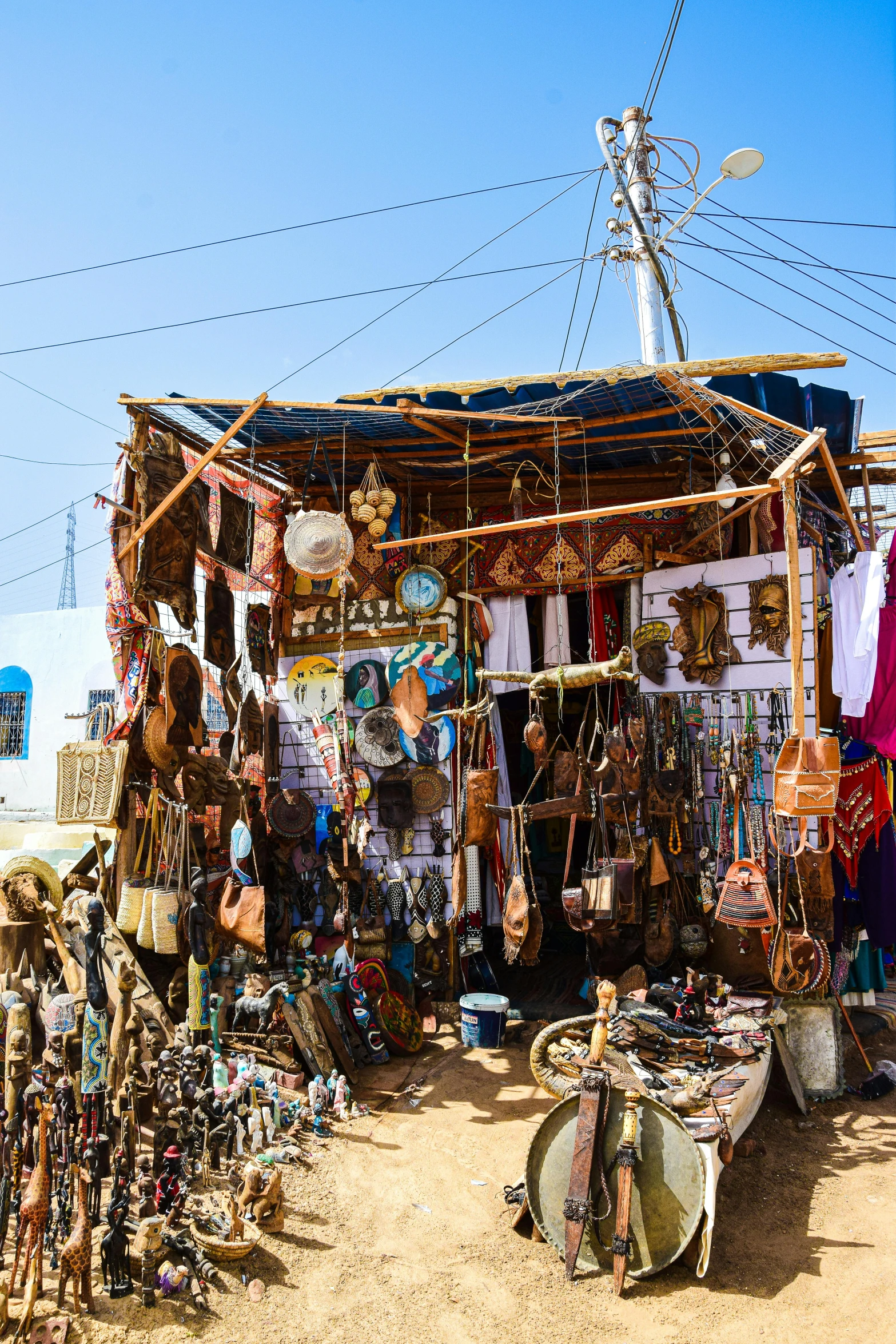 an open air market with clothing and shoes