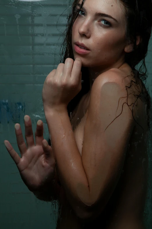 an image of woman standing in the shower