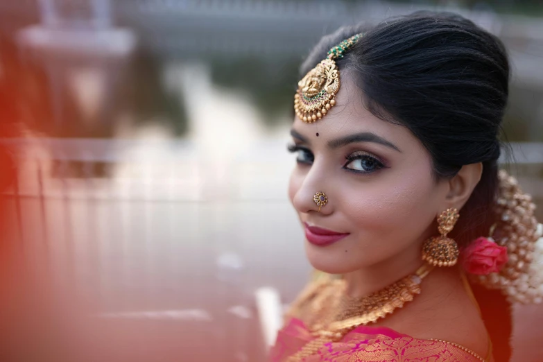 beautiful woman dressed in indian garb posing