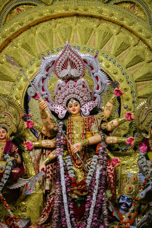 a woman in a elaborate gold costume