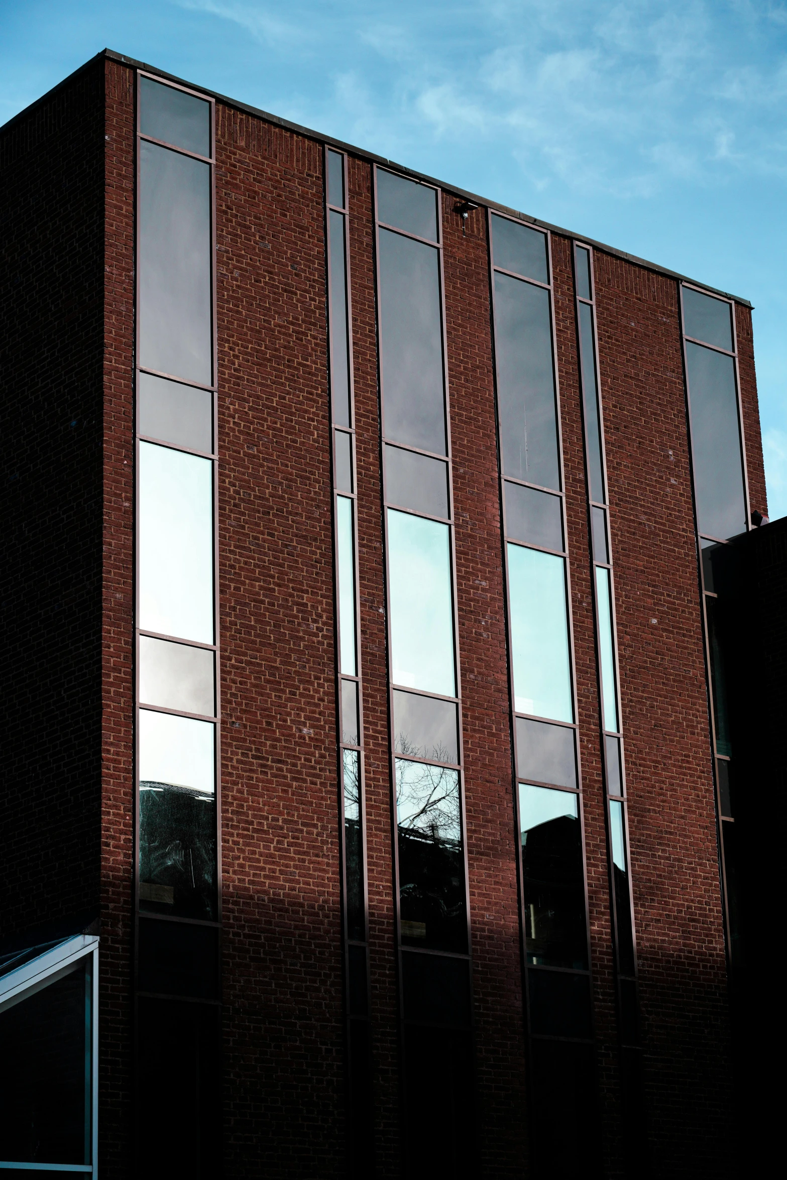 a brick building with a red light shining