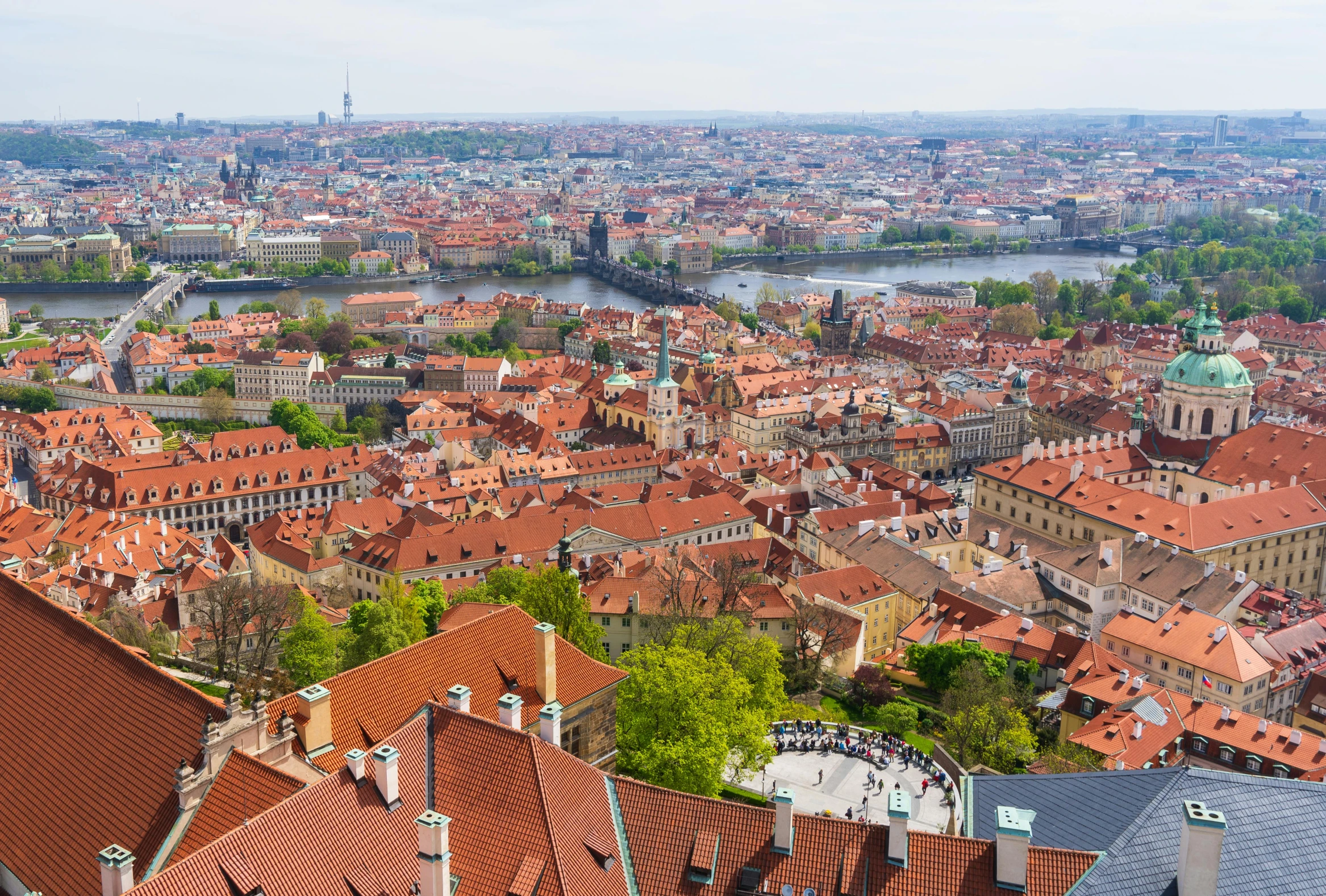 red tile rooftops are shown in the city