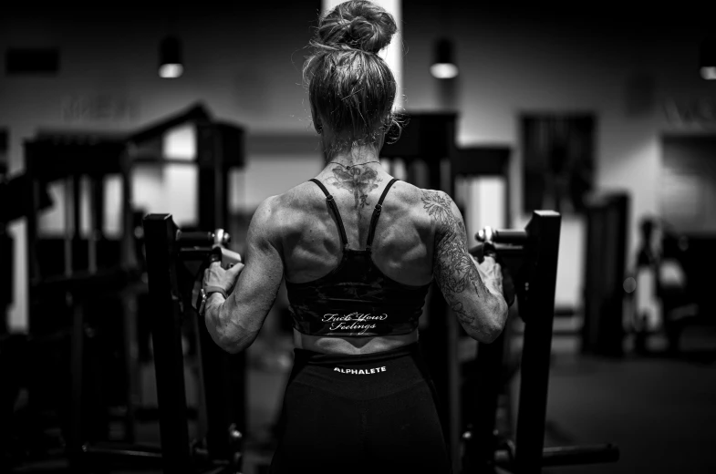 a female bodybuilt with muscles in her back