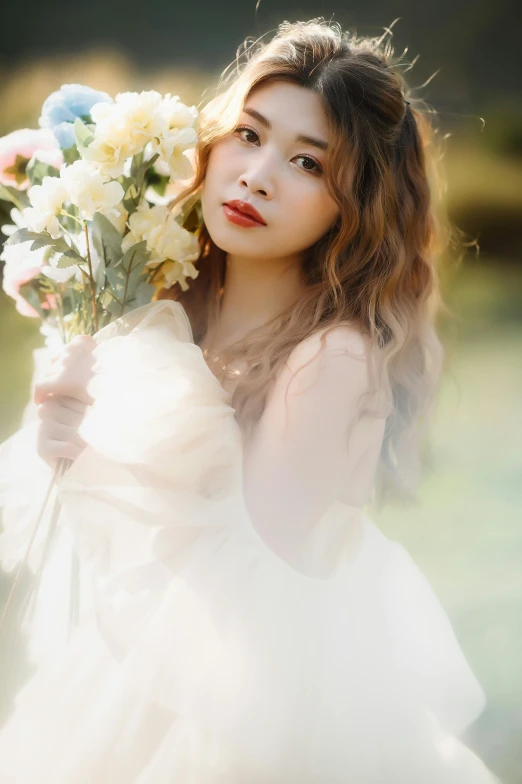 a woman is holding flowers in her hand