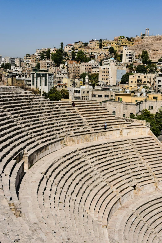 the auditorium and surrounding buildings have no people in it