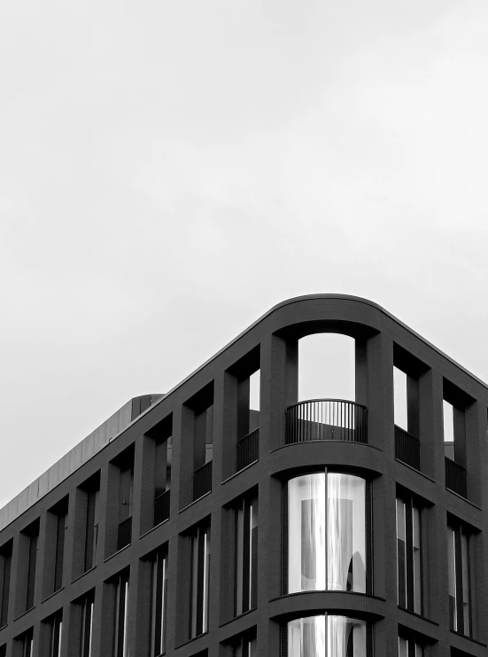 an apartment building with balconies and windows is featured