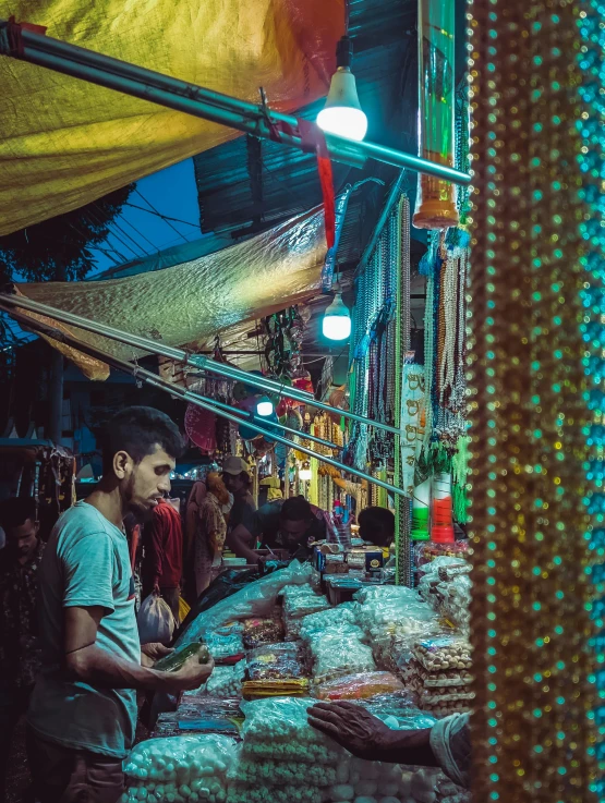 some people shops for items at the night market