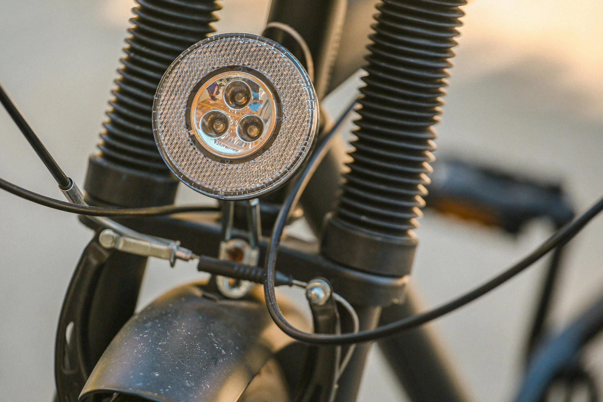 a close up of a bicycle with some wires