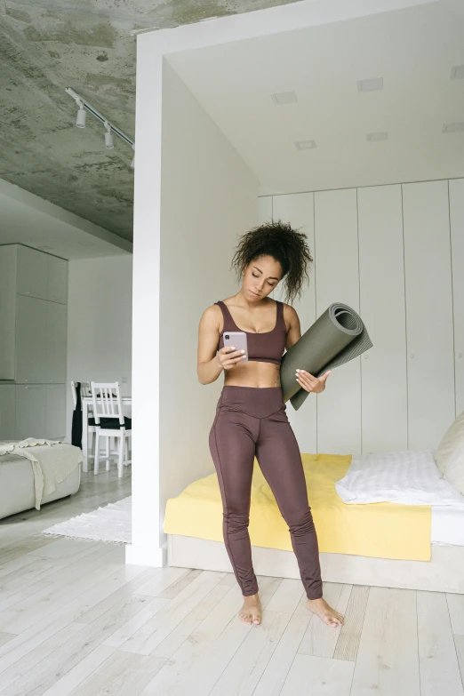 a woman standing in the doorway of her loft