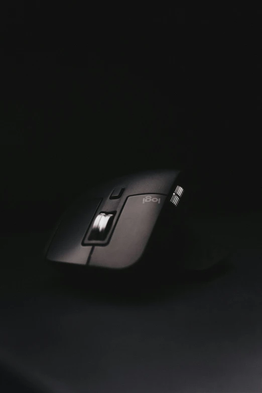 a computer mouse with a dark background