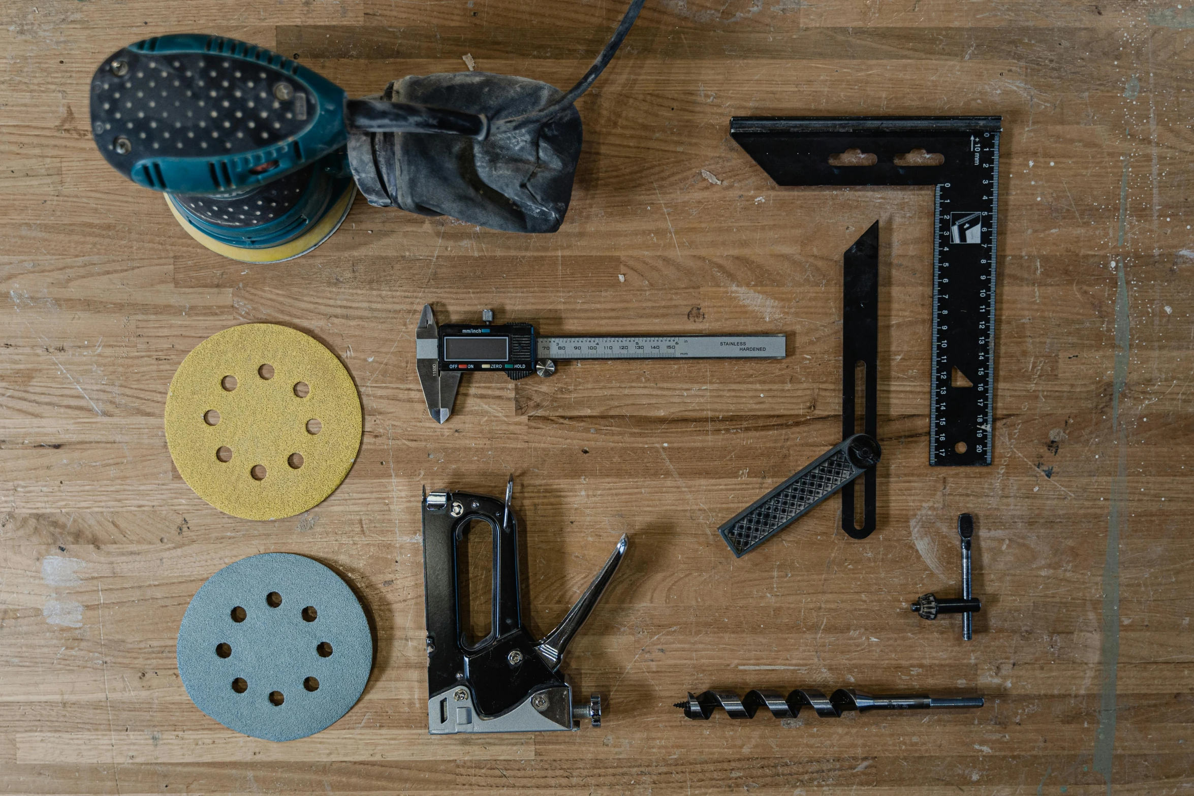 tools are lying on the floor as seen from above