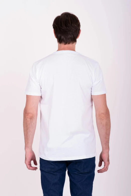 man in white shirt looking down at his back