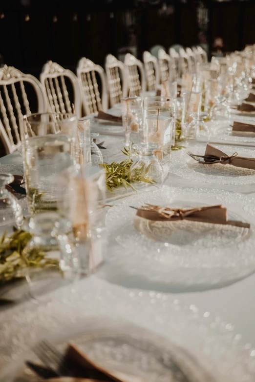 a table set with place settings for dinner