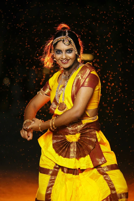 a woman is dressed in an indian attire