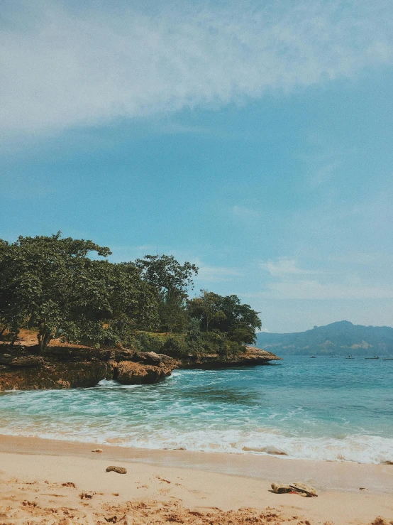 a couple of people are playing in the ocean