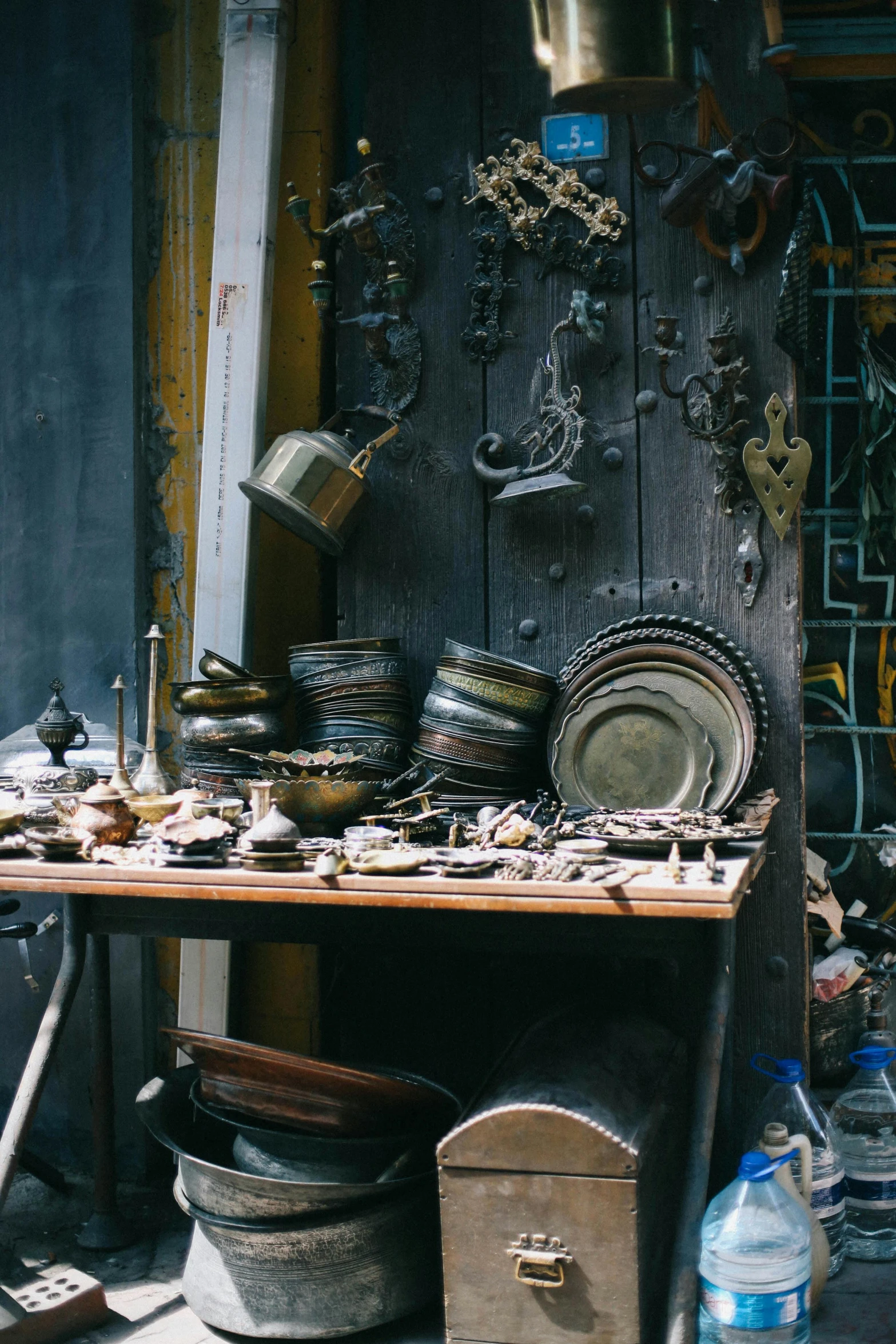 a table that has some pots and pans on it