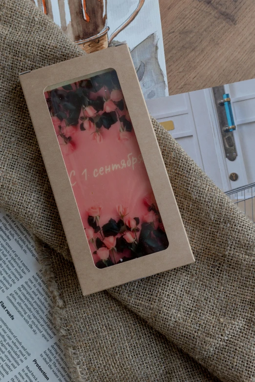 a book and some bottles are on the table