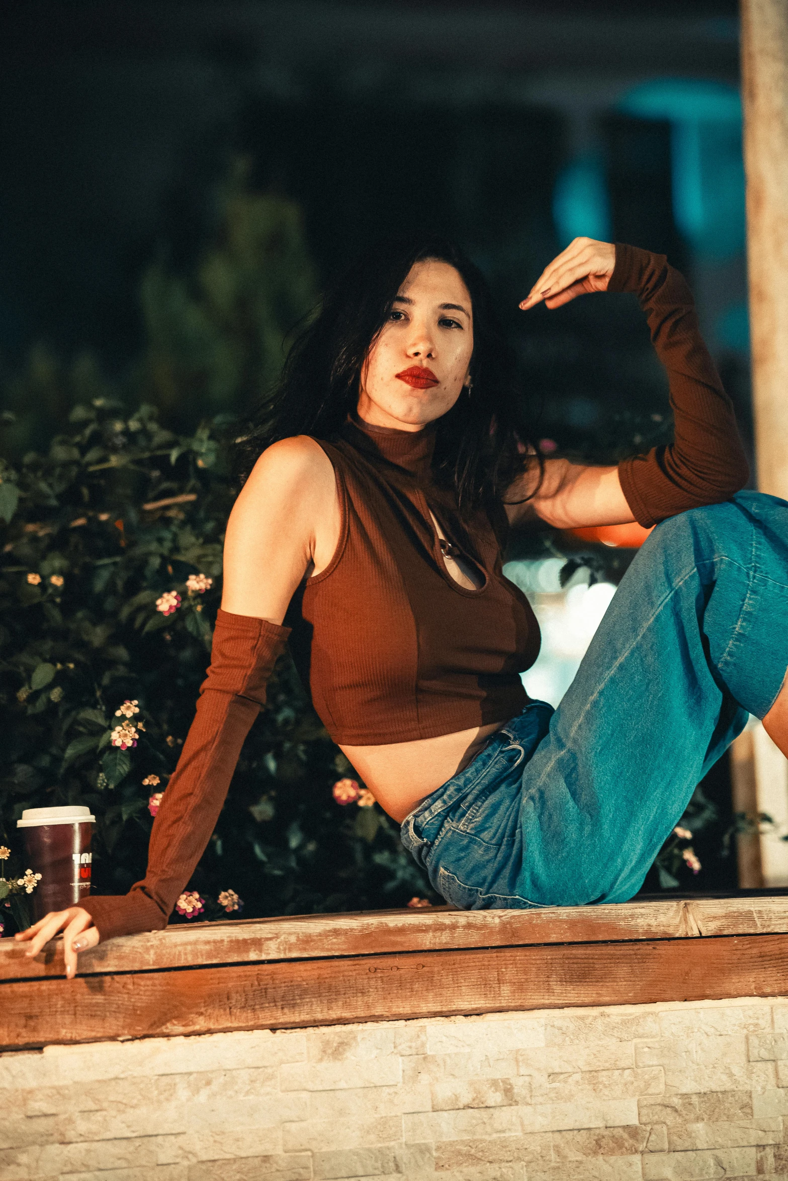 a person is posing for a po with their foot on a railing