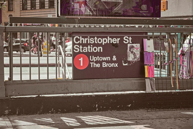 a street sign on the corner of the sidewalk