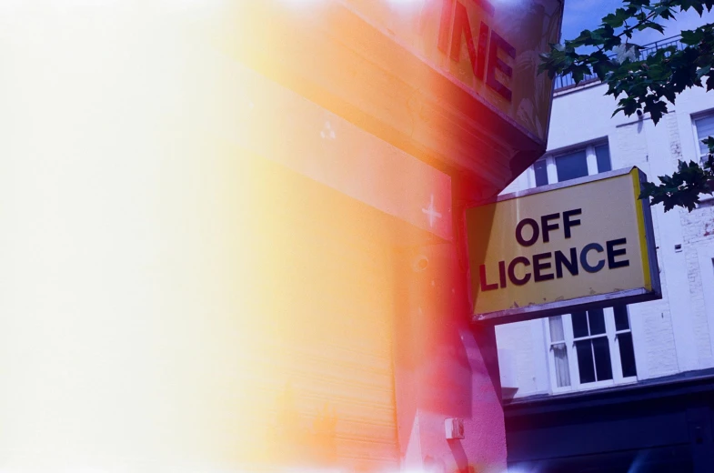 there is an image of a sign that says off licence