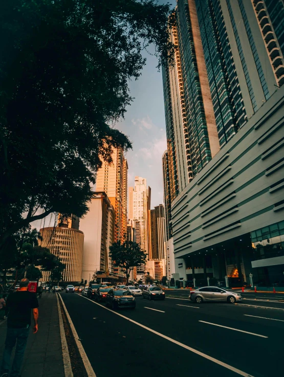 a road between buildings in the city