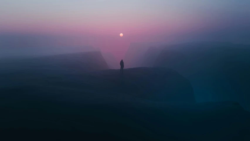 a lone man standing on the side of a cliff watching the sunset