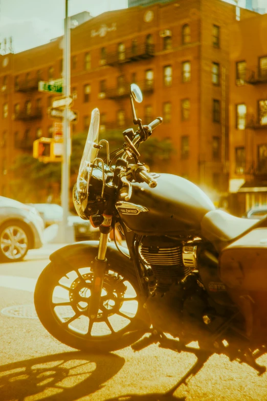 a motorcycle is parked in front of a very large building