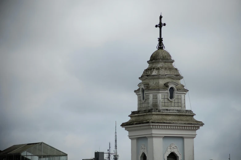 the steeple of a church in a city