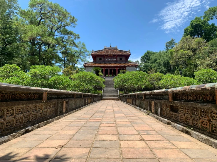 a walkway leads to an old building