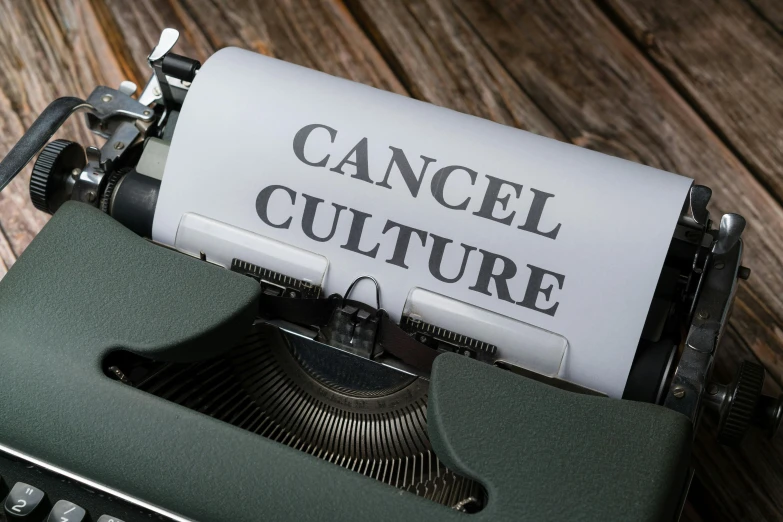 a typewriter with the words canel culture on it