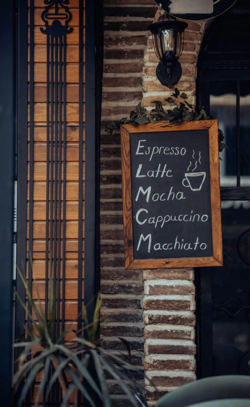 black and white sign displaying various dishes on wall