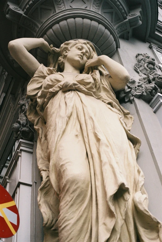 a large statue on top of a building